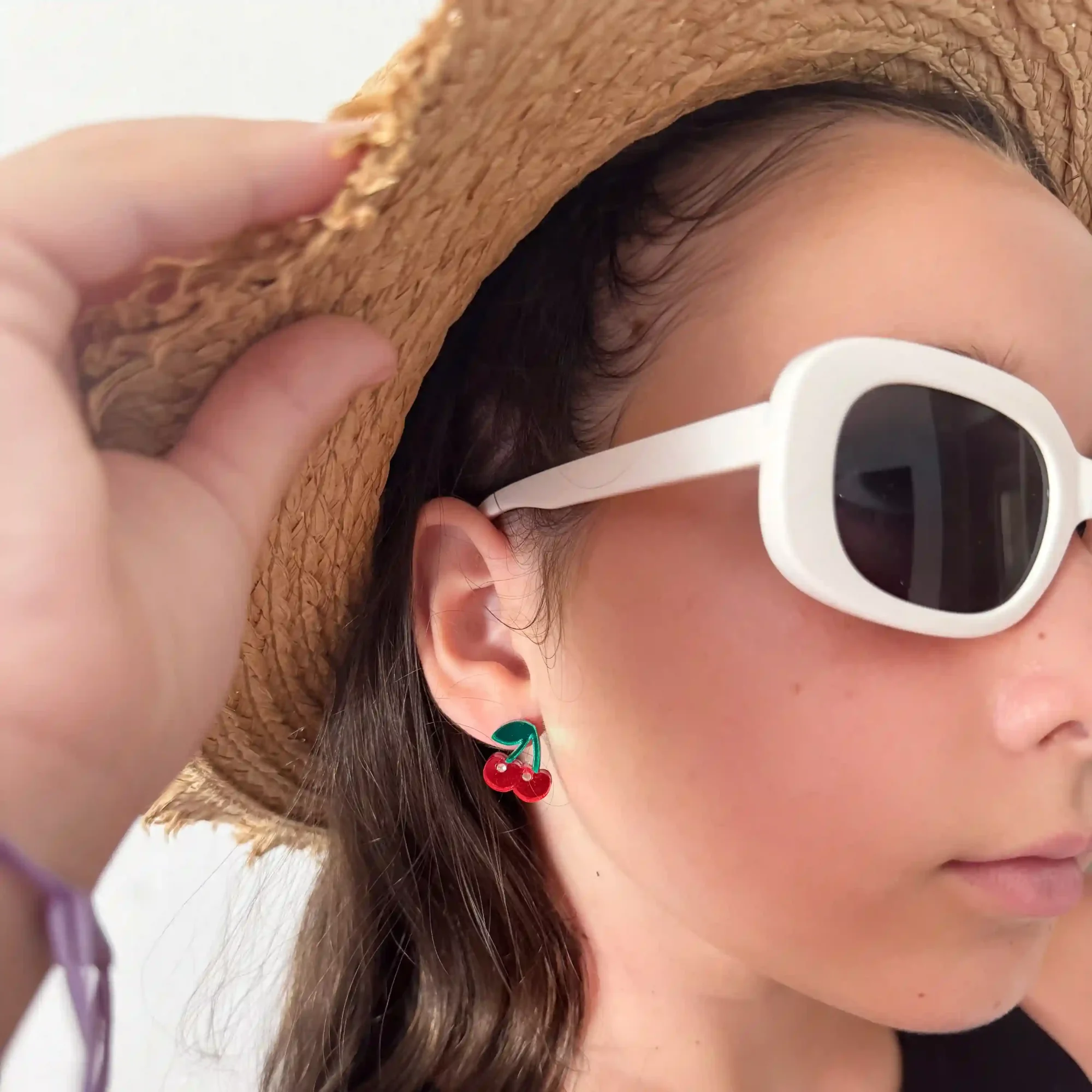 modelo con pendientes minis en metacrilato con forma de sandia
